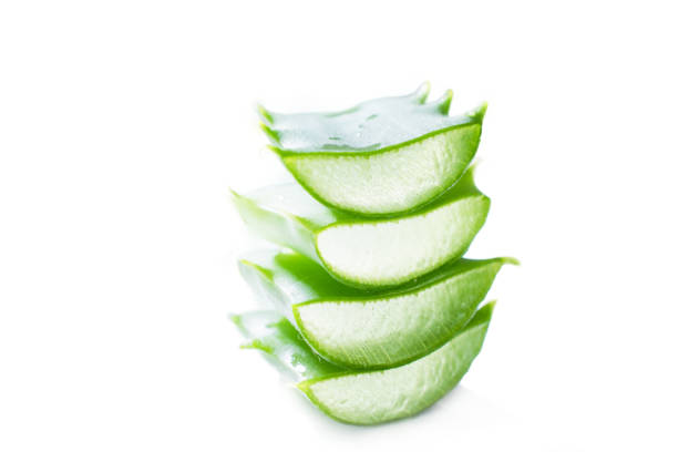 istock stacked sliced aloe vera gel leaf on white background. 971696480