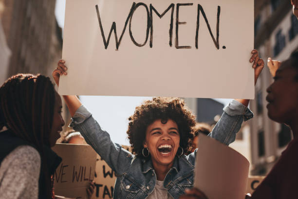 istock Female activist protesting for women empowerment 971736384