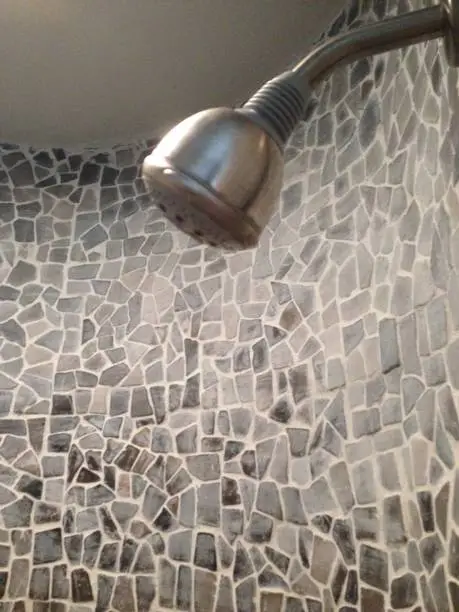 How to Remove Calcium Deposits from a Showerhead