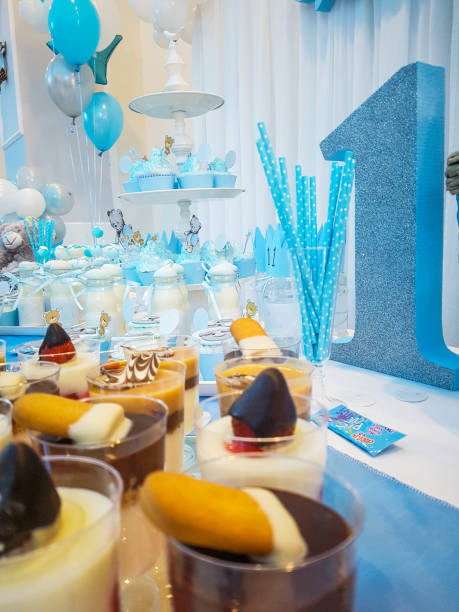 istock Birthday Boy Blue Party with Candy Presents and Cupcakes 971751442