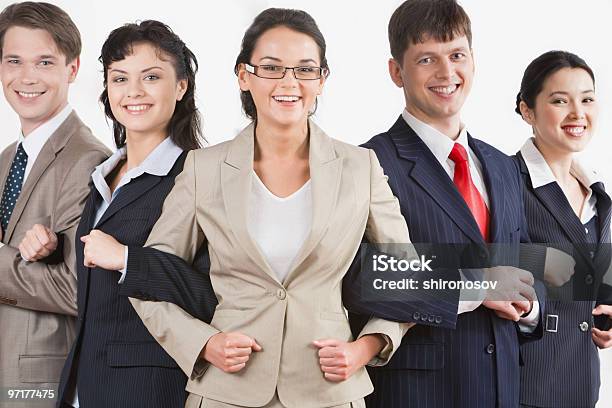 Businesspeople Linking Arms Symbolizing Alliance Stock Photo - Download Image Now - Adult, Adults Only, Business