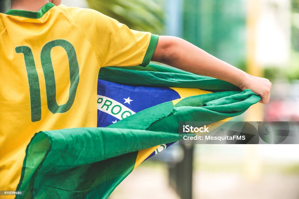 Patriot Brazilian Boy Holding the Flag of Brazil Brazil Stock Photo
