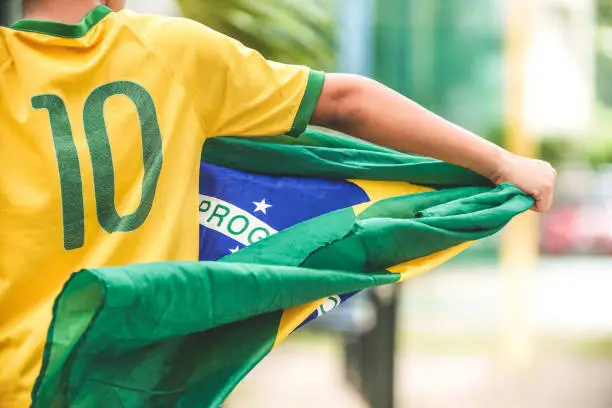 Brazilian Boy Holding the Flag of Brazil