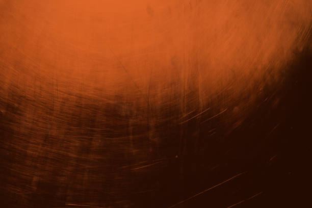 An intensely weathered grunge texture displays complex layers of rust, oxidation stains, deep scratches, and atmospheric wear patterns across a golden-bronze to dark amber color palette with organic deterioration marks scattered throughout the composition.