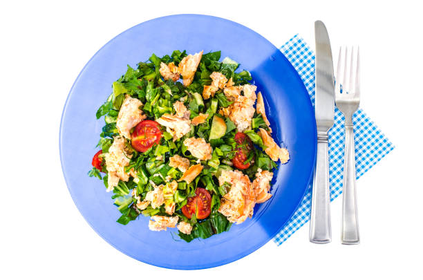 Salad and green leaves and fish. Studio Photo