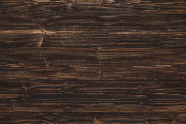 istock Dark brown wood texture with natural striped pattern background 971801818