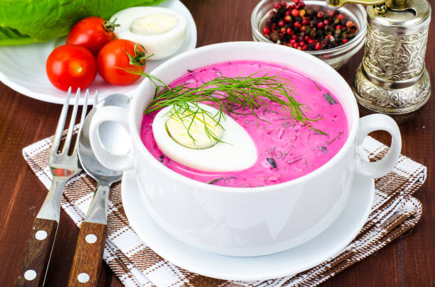 istock Cold beet soup with egg, fresh herbs, cucumber and herbs 971812216