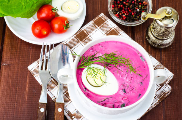 istock Cold beet soup with egg, fresh herbs, cucumber and herbs 971812380