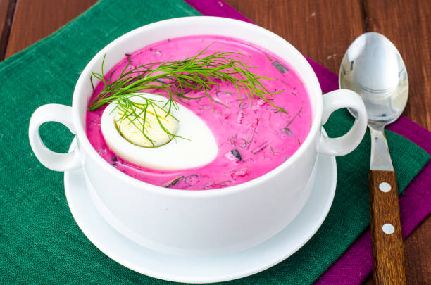 istock Cold beet soup with egg, fresh herbs, cucumber and herbs 971813438
