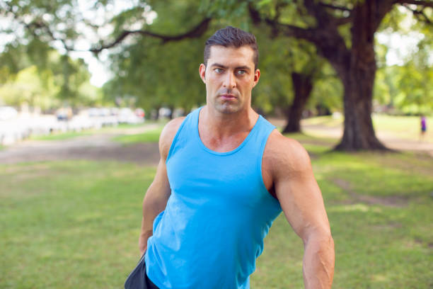 istock Young athletic man exercising outdoors 971813440