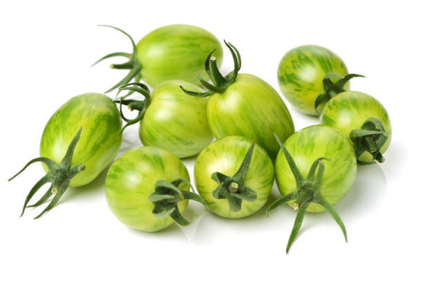 istock Green Tomato on the white background 971830256