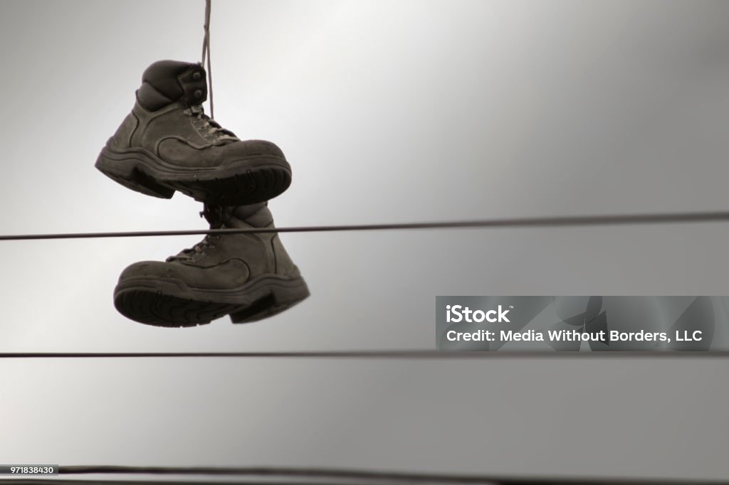 Departure for hijack athlete Boots Hanging From Power Lines In Seattle Stock Photo - Download Image Now  - Architecture, Boot, Design - iStock