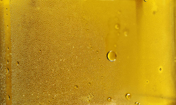 istock Many water drops on surface of transparent bottle 971841122