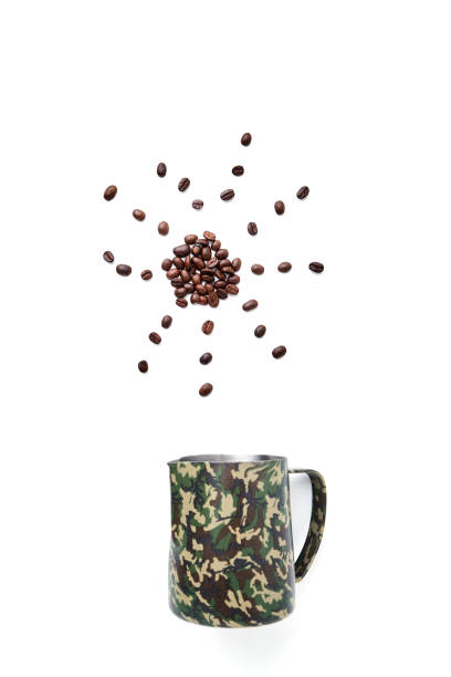 istock Steel Milk Pitcher with coffee beans 971846398