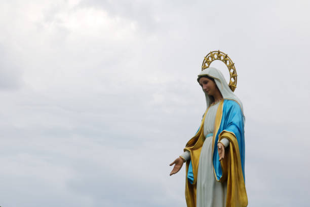 istock Saint Mary statue against the blue sky 971853492