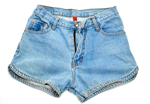 istock women jeans shorts on white background 971880110