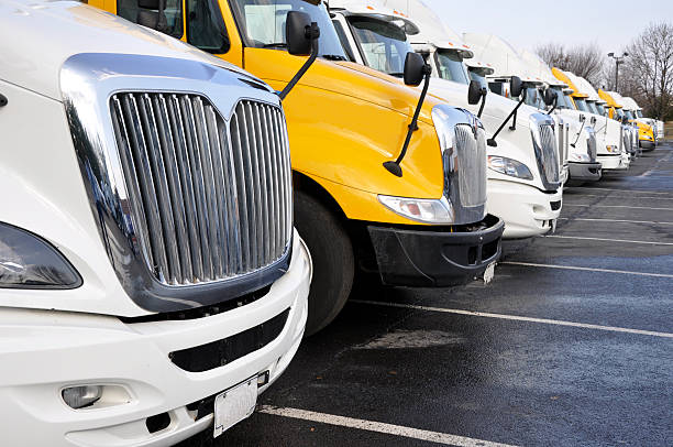 istock row of large trucks 97189087