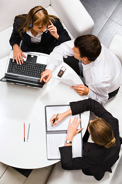 istock Overhead view of three business types collaborating 97191459