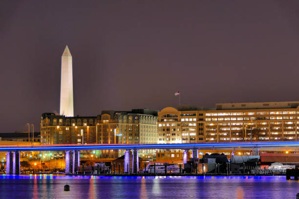 Washington DC USA Washington DC USA April 15, 2018 The 14th Street bridge and Washington Monument washington-dc-waterfront stock pictures, royalty-free photos & images