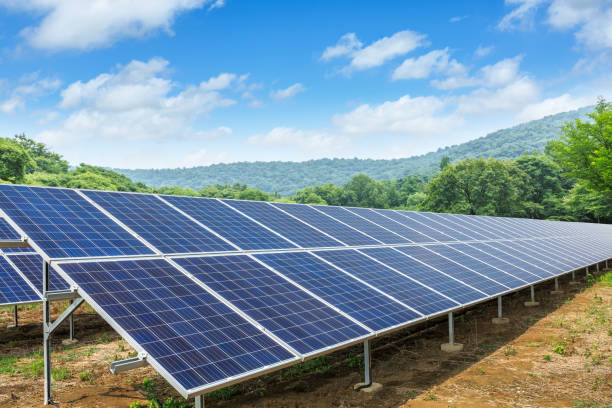 istock Solar panels and mountains landscape 971915140