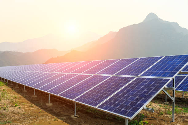 istock Solar panels and mountains landscape 971922292