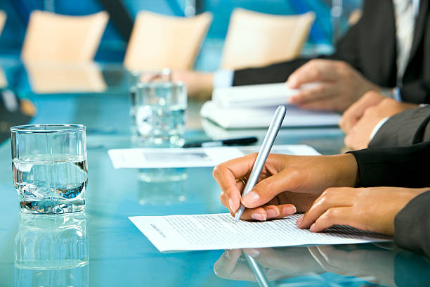 istock Hands making notes in a business meeting. 97192359