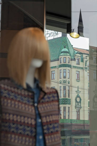 istock mannequins in the window 971937174