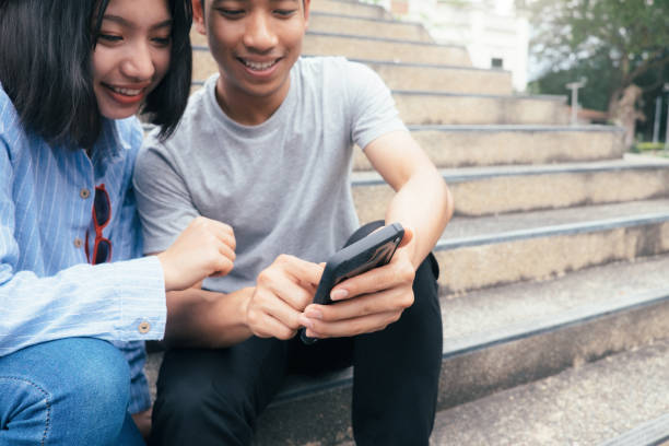 istock Teenage student using digital mobile phone 971942642