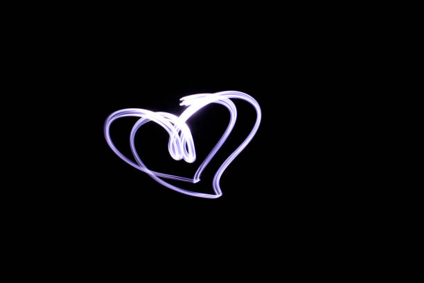 istock Long exposure, the heart made by light of lantern 971946132