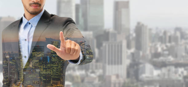 istock Double exposure businessman pointing at copy space 971949476