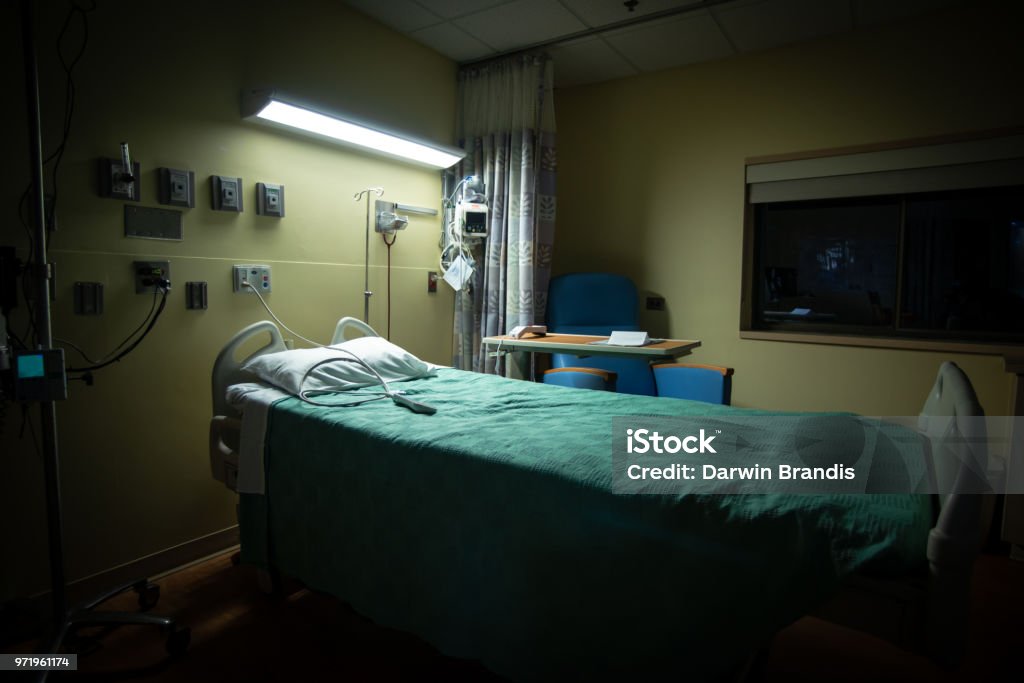 Empty Hospital Room An empty hospital room is ready for the next patient. Bed - Furniture Stock Photo