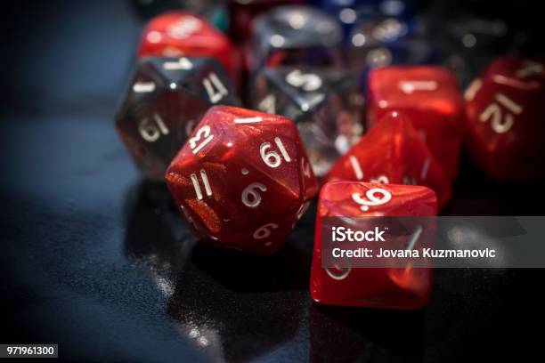 A Set Of Red And Transparent Rpg Dice Stock Photo - Download Image Now - Dice, Role Playing Game, Polyhedron