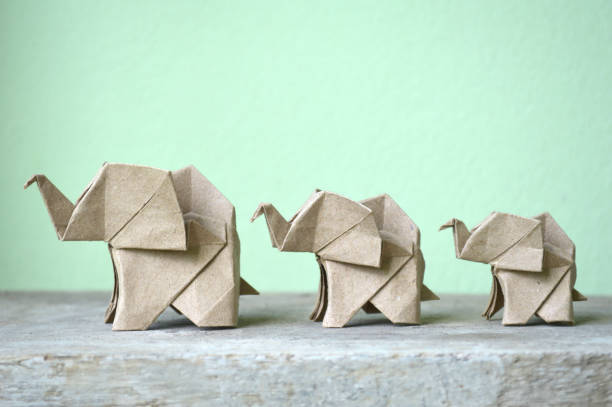 istock Brown origami elephant 971980658