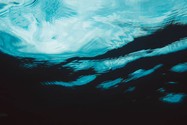 istock Water background of shine and reflect surface. 971980774