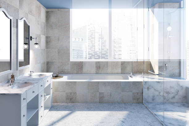 istock Beige tiles bathroom interior 971986390