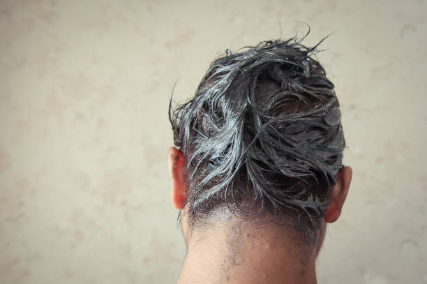 istock Men dye their hair, 971989482