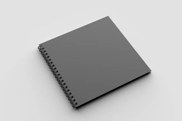 istock Spiral binder square notebook mock up with black cover isolated on soft gray background. 3D illustration. 971993018