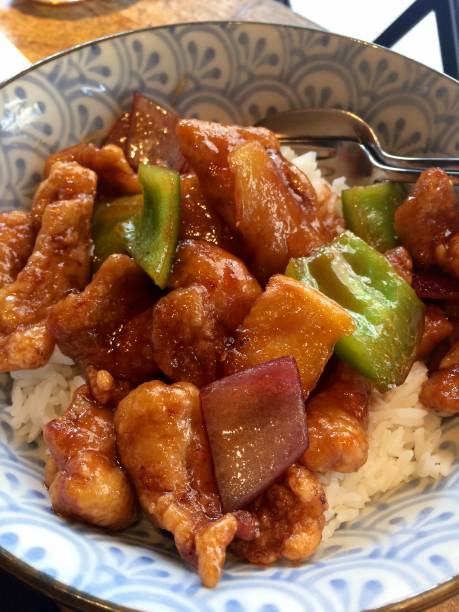 istock Sweet and Sour Pork with rice close up 971998012