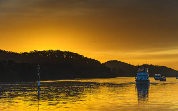 istock Waterscape Sunrise and Silhouettes on the Bay 972001208