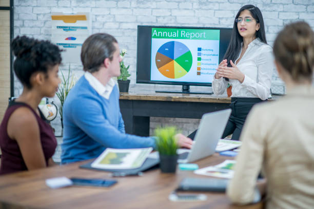 istock Woman Giving A Presentation 972001322