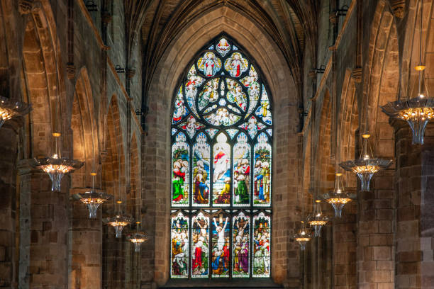Interior St. Giles Cathedral in Edinburgh with stained glass window Edinburgh, Scotland - May 24, 2018: Interior St. Giles Cathedral in Edinburgh with stained glass window royal mile stock pictures, royalty-free photos & images
