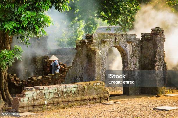 Vietnamese Woman Among Ruins Of Old Buildings Hue Vietnam Stock Photo - Download Image Now