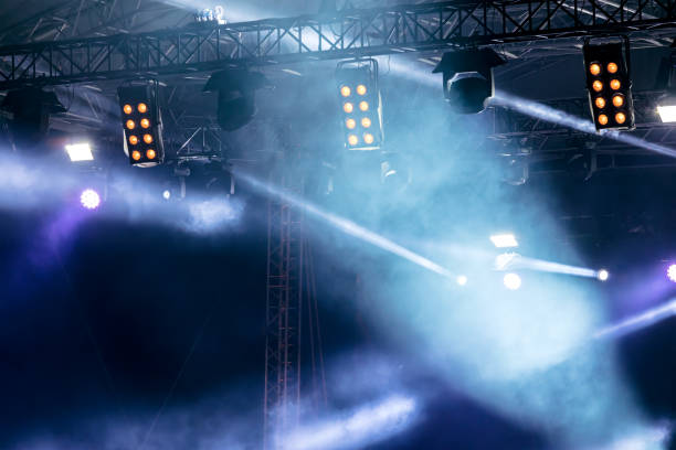 istock stage lights during a rock concert with smoke 972003870
