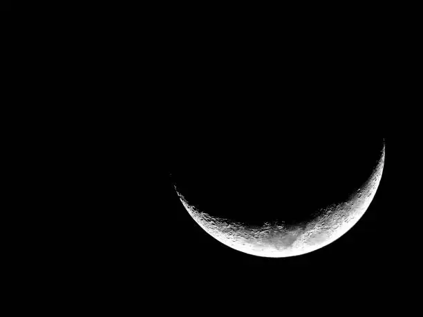 Crescent moon and craters