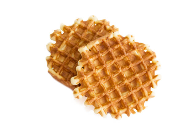istock Soft waffles, sweet pastries, isolated on white background, 972007296