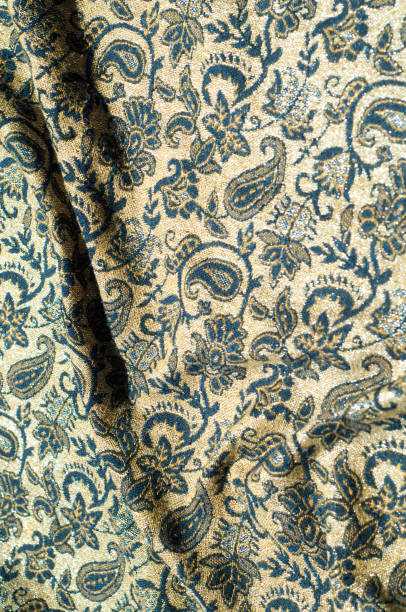 istock Texture, background, pattern. White girl's skirt, with a broken pattern in the form of circles. White lace cotton 972020278