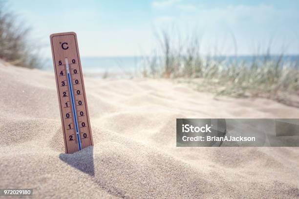 Thermometer On The Beach Background Stock Photo - Download Image Now - Heat Wave, Heat - Temperature, Summer