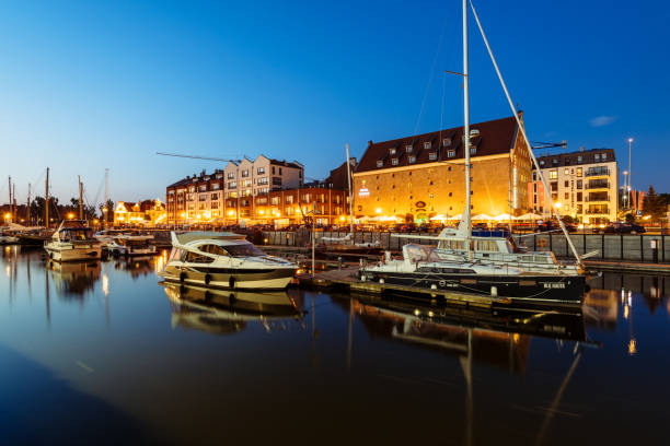 Gdansk, Poland - May 10, 2018: Sailboats and luxury yachts moored in marina in Gdansk, Poland.