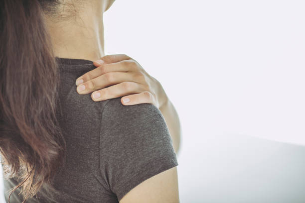istock Asian women and stiff shoulders 972042560