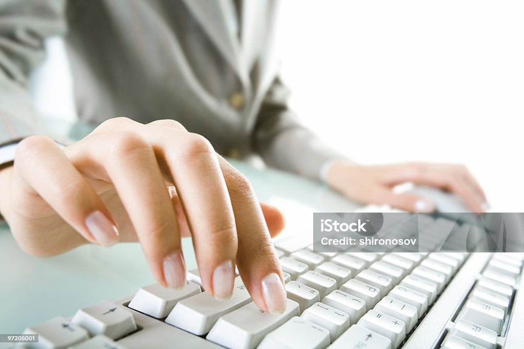 Pressing buttons  File Clerk Stock Photo